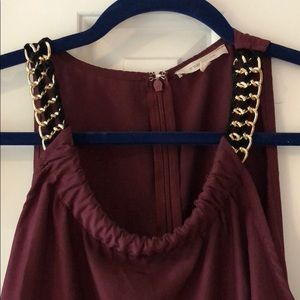Burgundy top w/ black and gold metal chain straps